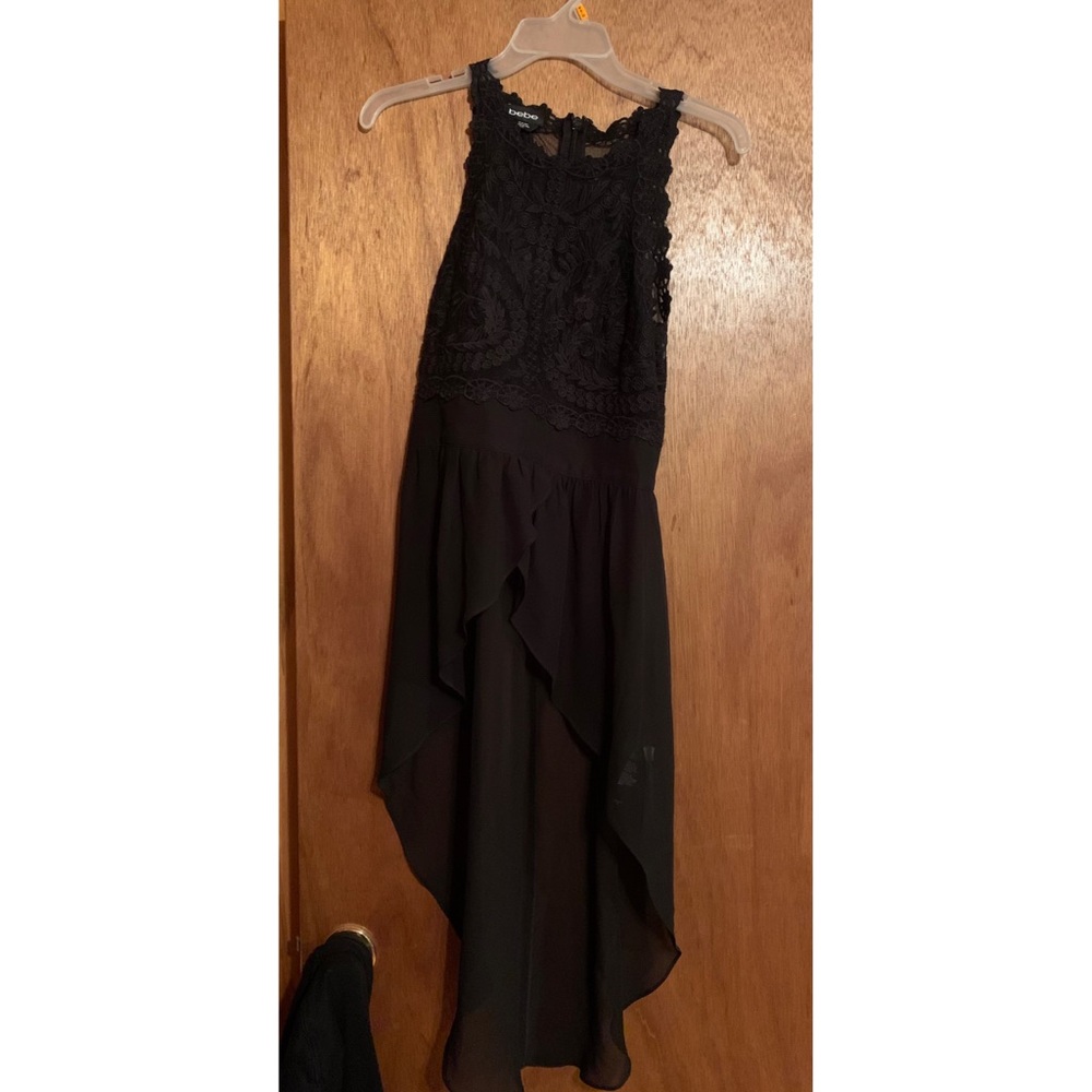 Bebe high low tank top.